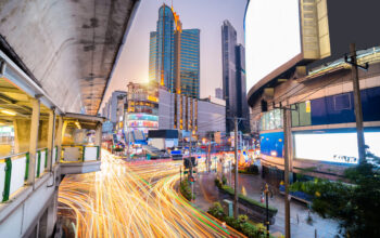 Twilight view cityscape, commercial buildings and modern condominiums in the area of ​​Asoke intersection, Bangkok, Thailand